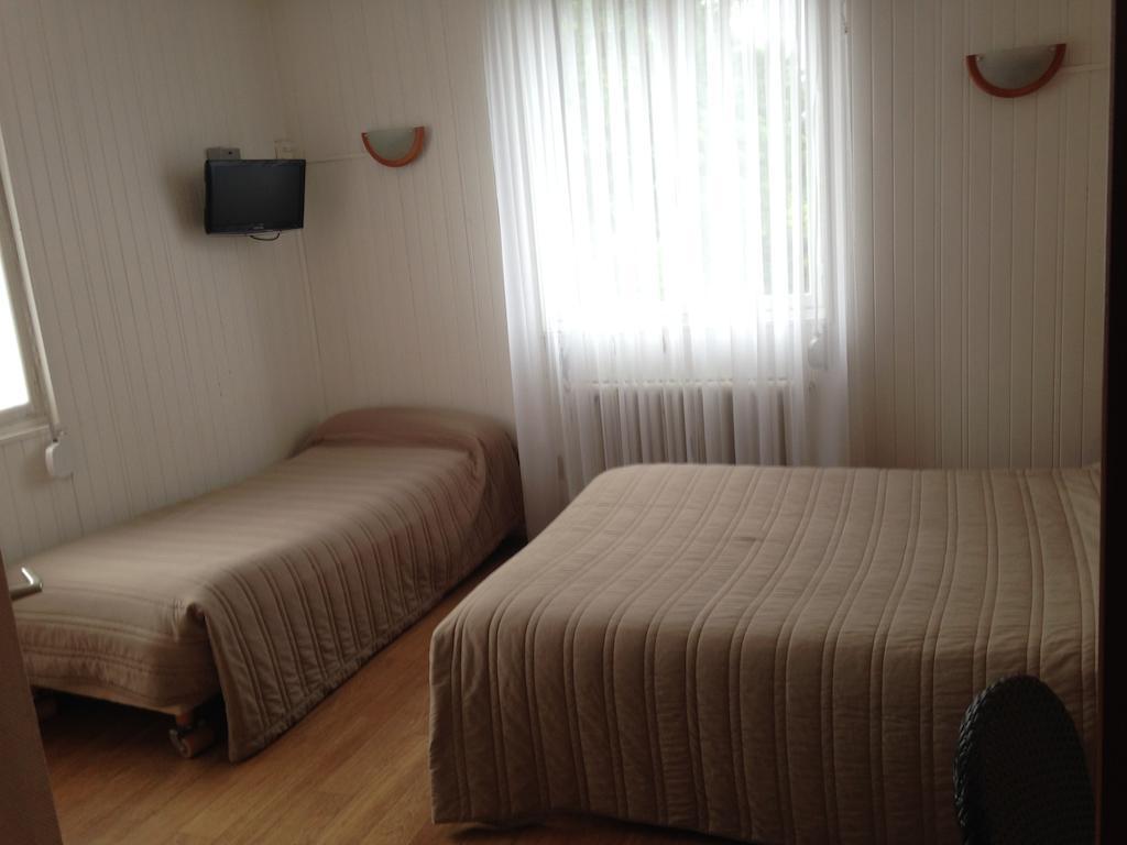 Arcantis Hotel La Residence Сержі Номер фото